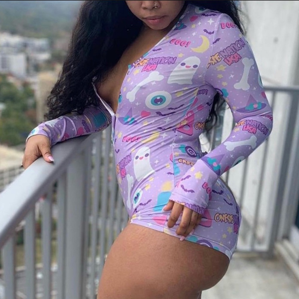 Purple Pajamas with Playful Patterns and Long Sleeves